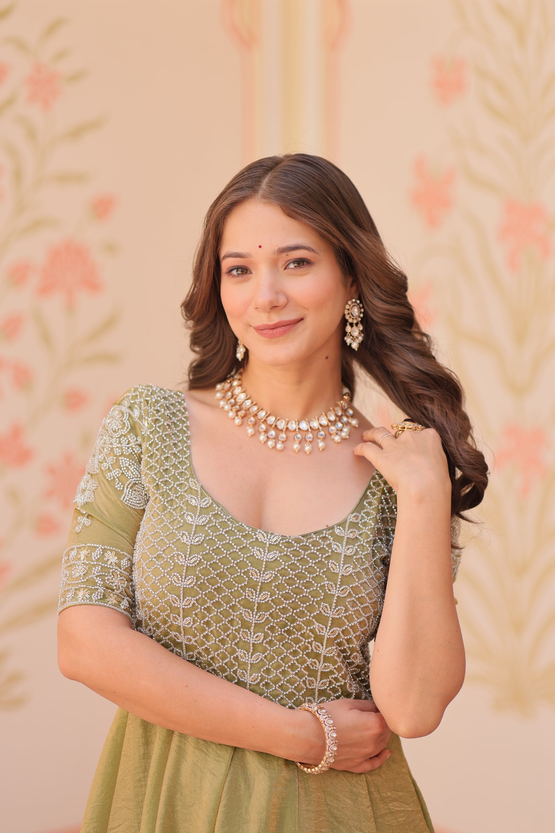 Vaibhavi Pista Green Gown in Fendy Silk with beads embroidery, 3.5m flair & boat neck – a graceful, fully-stitched festive outfit.